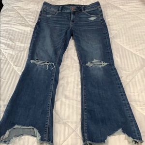 Hi rise distressed flared jeans